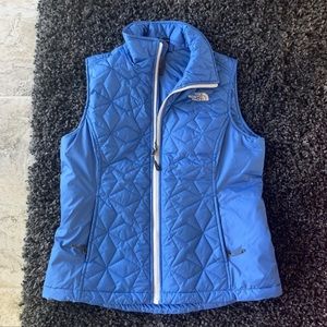 The North face blue zip up vest